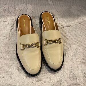 LISAMVCKY Cream Mules with Gold Chain Detail
